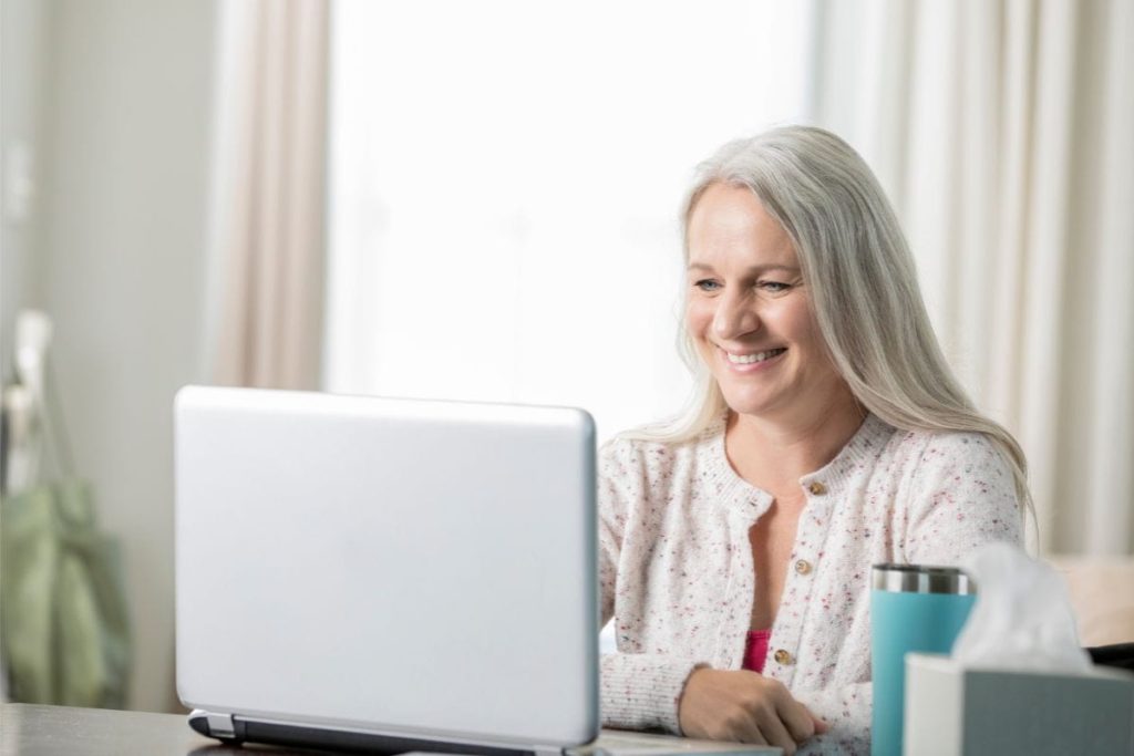 client on laptop during virtual IOP program in Scottsdale