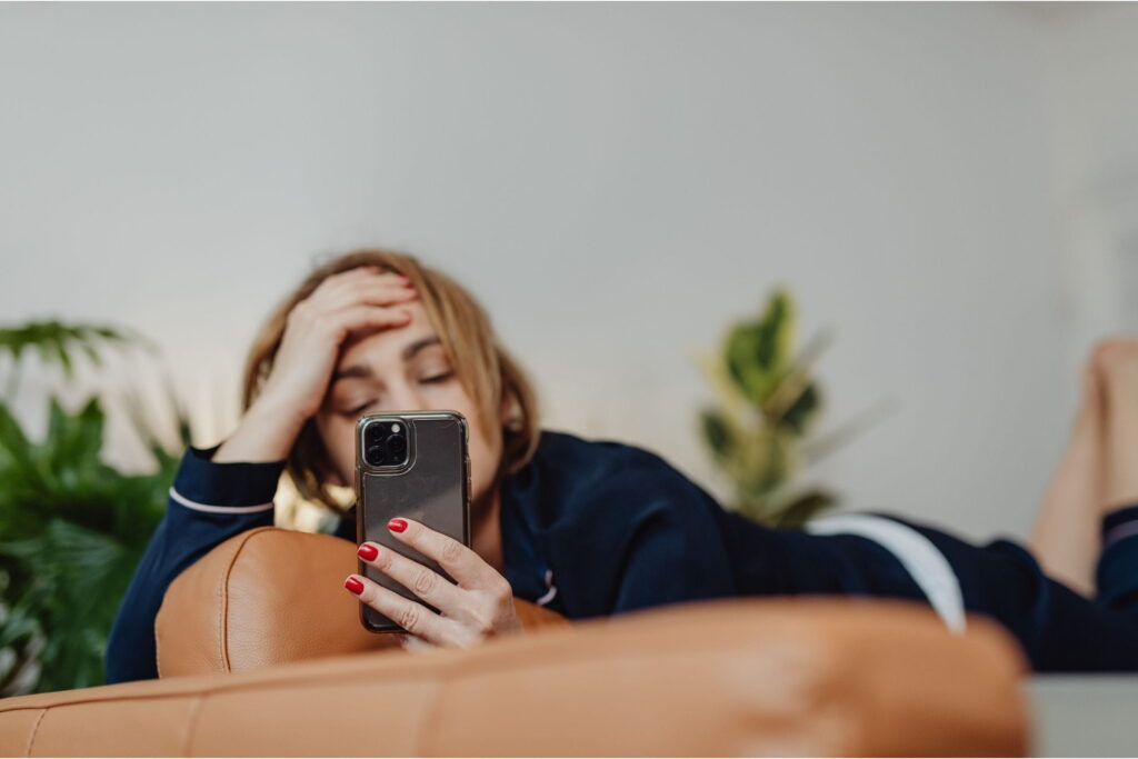 adult overusing her phone and technology