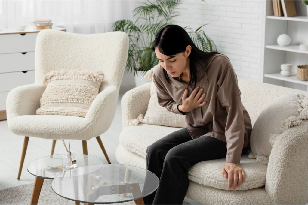 woman with panic disorder struggles with a panic attack
